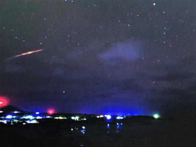 オレンジ色の光　奄美市から撮影