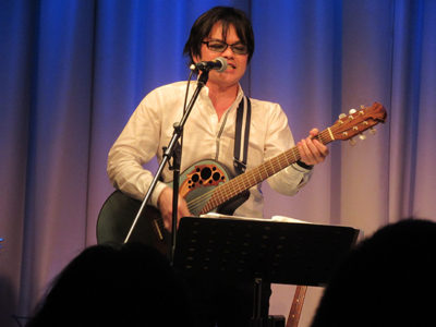 平田さん軸に奄美を歌で応援